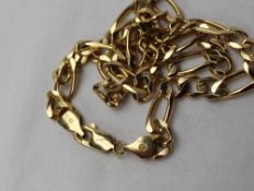 A 14k yellow gold necklace with oval and faceted links, approximately 35.