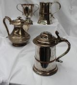 A silver plate on copper lidded tankard, with a domed lid,
