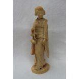 A 19th century ivory carved figure of a geisha,