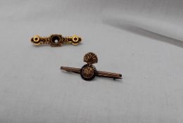 A 9ct yellow gold Royal Welsh Fusiliers bar brooch together with a 15ct gold bar brooch