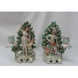 A pair of Derby candlestick figures of Mars and Venus, Mars with a cockerel by his side,