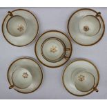 A Swansea Paris flute part teaset comprising five cups and saucers, breakfast cup, slops basin,