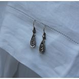 A pair of Diamond drop earrings,