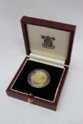 A 1989 Welsh Gold medallion, dated 1989, 1/4 oz of Welsh gold, proof,