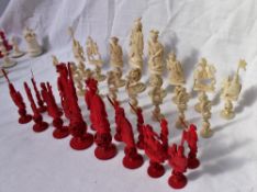 A 19th century Chinese bone chess set, natural and stained red,