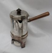 A George IV silver chocolate pot / hot water pot, of cylindrical form,