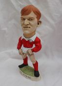 A resin Grogg of Neil Jenkins, in a red Wales shirt with No.10 on the reverse, 22.