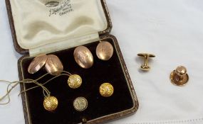 A pair of 9ct yellow gold cufflinks, together with a 9ct gold shirt stud, approximately 8.