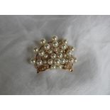 A pearl set brooch,