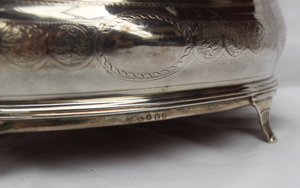 A George III silver cruet stand, of pointed oval form, with decorative roundels, on four feet, - Image 3 of 4