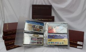 Nine albums of Royal Mail Presentation Packs of stamps,