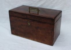 A 19th century mahogany table top cabinet of rectangular form with a recessed brass handle,