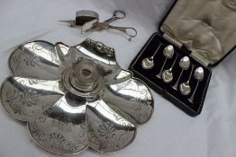 A Victorian silver desk inkwell, of shell shape engraved with anthemions, initialled, London, 1855,