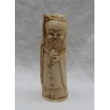 A 19th century Chinese carved ivory figure of Shou Lao, holding a dragon headed staff and a peach,