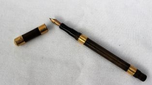 A De La Rue Onotoself filling fountain pen with yellow metal bands