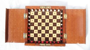 A "Whittington pattern" travelling chess set, English, late 19th century,