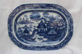 A 19th century pearlware blue and white pottery meat platter,