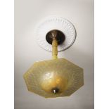 AN ART DECO CEILING LAMP / 1920s, France Lampshade and segments executed in light yellow glass;