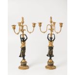 A PAIR OF EMPIRE CANDELABRAS