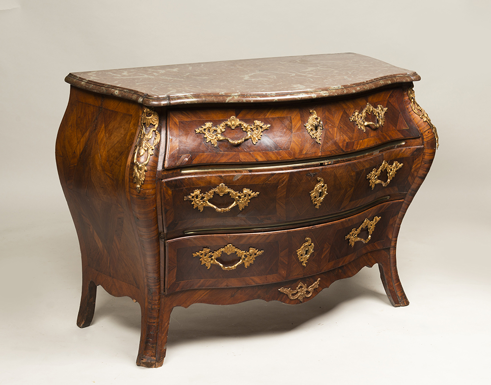 A BAROQUE COMMODE