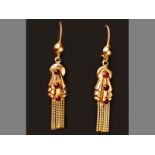 A PAIR OF 18CT YELLOW GOLD EARRINGS, each earring set with three cabochon garnets ending in