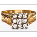 AN 18CT YELLOW GOLD AND DIAMOND RING, nine claw set brilliant cut diamonds in square form, raised
