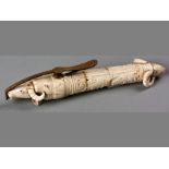 A NORTHERN INDIAN IVORY CURIO, 19TH /20TH CENTURY, in the form of a gunpowder flask, the ivory