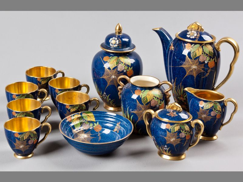 A COLLECTION OF CARLTON WARE IN BLEU ROYALE GROUND COLOUR COBWEB PATTERN, comprising a lidded