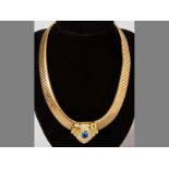 A 14CT YELLOW GOLD, SAPPHIRE AND DIAMOND NECKLACE, centre cabochon sapphire surrounded by thirty-