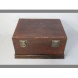 AN EARLY 20TH CENTURY CHINESE LEATHER COVERED CHEST, of rectangular form, with brass lock-plates