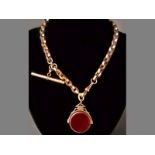 A 9CT YELLOW GOLD ALBERTINA, belcher links with T-bar and swivel carnelian and blood stone seal,