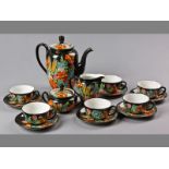 A DECORATIVE MID-EUROPEAN TEA SET, comprising a teapot, creamer, sugar box and six cups and saucers,