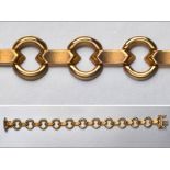A 9CT YELLOW GOLD FANCY LINK CHAIN, with tongue clasp and two figure eight safety catches, 18.8cm