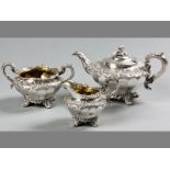 A WILLIAM IV THREE PIECE SILVER TEA SET, LONDON 1835-1837, I.W.W.M., comprising a teapot, sugar