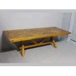 A PIERRE CRONJE YELLOWWOOD AND OTHER INDIGENOUS WOODS REFRECTORY TABLE, signed, the rectangular