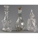 A COLLECTION OF THREE GLASS DECANTERS, various shapes and sizes, 32cm high (tallest), (3).