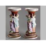 A PAIR OF MID-19TH CENTURY CONTINENTAL FIGURAL CENTRE PIECES, depicting "The Three Graces", in