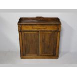 A REGENCY ROSEWOOD CHIFFONIER, the galleried top above a long drawer with two rectangular panelled