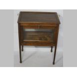 A LATE VICTORIAN OAK TEA/DISPLAY TABLE, the removable tray with brass handles above a glazed display