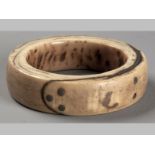 AN EARLY 20TH CENTURY AFRICAN IVORY BANGLE, possibly form Gurunsi (Northern Ghana and Burkino Faso),