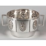A SILVERPLATE WMF JARDINIERE, of circular form, with twin square C-form handles, body divided into