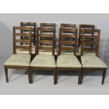 A SET OF EIGHT PIERRE CRONJE MAHOGANY LADDERBACK DINING CHAIRS, the slatted backs with straight