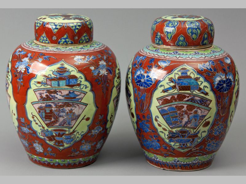 A RARE PAIR OF CHINESE KANGXI PERIOD GINGER JARS AND DOMED COVERS, CIRCA 1680, originally