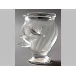 A LALIQUE FROSTED AND POLISHED GLASS VASE, depicting two doves in flight, on a circular pedestal