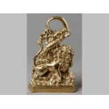 A REGENCY BRASS DOOR STOPPER, depicting a lion at battle with a serpent, the base with lead