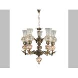 A CERAMIC AND BRASS FIVE-LIGHT CHANDELIER, each drip pan with a ceramic attachment, on foliate