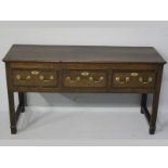 AN 18TH CENTURY ENGLISH OAK DRESSER, the moulded top above three drawers banded in mahogany,