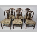 A SET OF SIX EDWARDIAN HEPPLE-WHITE MAHOGANY DINING CHAIRS, the hooped backs with wheat sheave