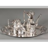 AN ART DECO WMF FIVE PIECE TEA AND COFFEE SET, by Orivit, comprising of coffeepot, teapot,