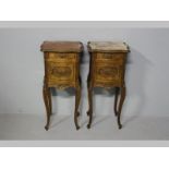 A PAIR OF CONTINENTAL WALNUT PEDESTAL CABINETS, in the French manner, the serpentine tops of rouge